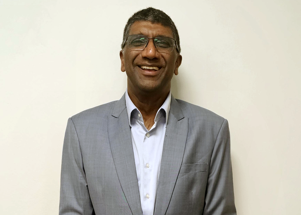 Headshot of Dr Devan Moodley, Oncologist